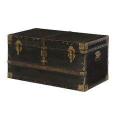 an old black trunk with gold handles and latches on the top is sitting against a white background