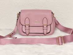 NWT Coach Lucy Crossbody Bag in Refined Pebble leather Pink C6782. Color: IM/ Pink Gift receipt included Original Price $350 Product Details Refined pebble leather Inside zip and multifunction pockets Snap closure, fabric lining Outside open pocket Detachable strap with 25" drop for shoulder or crossbody wear 8 3/4" (L) x 6 1/4" (H) x 3 1/4" (W) Style No. C6782 Gold Bag, Coach Outlet, Pink Gifts, Purse Bag, Crossbody Purse, Pink Fashion, Pebbled Leather, Purses Crossbody, Snap Closure