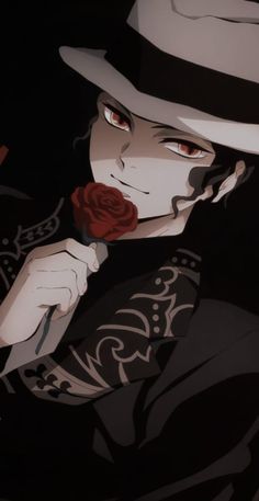 a man in a fedora holding a rose