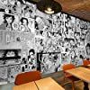 an empty restaurant with wooden tables and orange chairs in front of a black and white wall