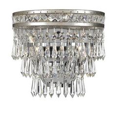 a crystal chandelier hanging from the ceiling