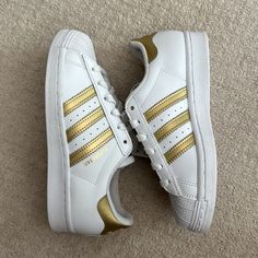 New Unused Adidas Gold Superstars Size 5 Women’s No Box Adidas Gold, Adidas Black Gold, Adidas Sneakers With Rose Gold, Adidas Shoes Black And Gold, Adidas Superstar Gold, Adidas Superstar Supercolor, Gold Adidas, Gold Outfit, Adidas Shoes