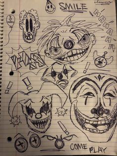 a notebook with drawings of clowns and smile faces on the page in which they appear to be playing