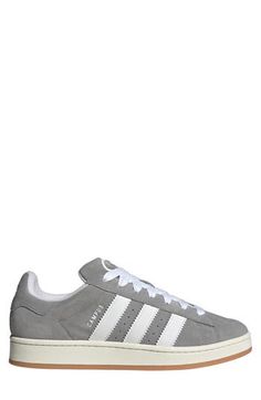 A low, padded collar and wide base nod to the skater and hoopster heritage of a sneaker sporting the streamlined profile that's kept it a perennial favorite. Lace-up style Removable insole Leather upper/textile lining/rubber sole Imported Lace-up Skate Shoes With Three Stripes Branding, Adidas Low-top Platform Sneakers, Adidas Low-top Skate Shoes With Vulcanized Sole, Adidas Low-top Platform Sneakers For Streetwear, Adidas White Skate Shoes For Streetwear, Sporty Low-top Adidas Platform Sneakers, Sporty Adidas Platform Sneakers For Streetwear, Adidas Sporty Low-top Platform Sneakers, Low-top Three Stripes Skate Shoes