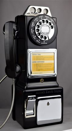 an old fashioned phone is on display