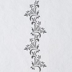 a white paper with black floral designs on it