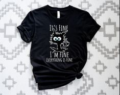 It's Fine I'm Fine Everything Is Fine Shirt, Funny Cat Tee, Sarcasm Shirt, Introvert Shirt, I'm Fine Black Cat T-shirt ➤HOW DO I KNOW WHAT SIZE FITS ME BEST To See Our Size Chart, Please Make Sure To Scroll Through The Photos. The Measurements For Our Shirts Are Listed There As Well. These Are A Unisex Fit, So They Will Be Looser If You Order Your Normal Women's Size. For A More Fitted Look, Most People Will Size Down. Please Keep In Mind That Our Size Chart Measurements Are Not in Circumference Funny Black Top With Cat Design, Funny Black Cat Design Top, Sarcasm Shirts, I'm Fine, Cat Funny, Cat Tee, Everything Is Fine, Cat T Shirt, Crazy Cat