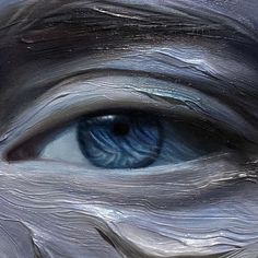 the blue eye is painted in silver and has wavy lines on its iris's side