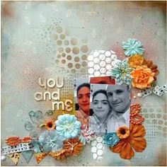 a scrapbook page with an image of two people in the middle and flowers around it