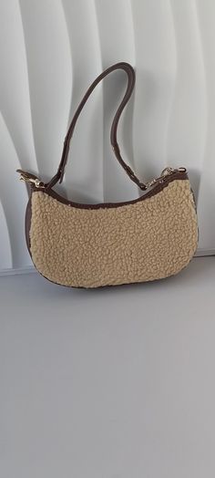 SPECIFICATIONSBrand Name: miyagawaHandbags Type: Shoulder BagsTypes of bags: Shoulder & HandbagsMain Material: POLYESTERLining Material: POLYESTERShape: HobosPlace Of Origin: HE BEI ProvincePlace Of Origin: HE BEI ?ProvinceOrigin: Mainland ChinaCN: AnhuiHardness: SOFTPattern Type: PatchworkInterior: Interior CompartmentDecoration: noneExterior: noneOccasion: VersatileClosure Type: zipperGender: WOMENStyle: vintageModel Number: 6A139Number of Handles/Straps: Single Handmade Artisan Brown Saddle Bag, Brown Saddle Bag With Turn-lock Closure For Everyday Use, Rectangular Saddle Bag With Adjustable Strap For On-the-go, Brown Saddle Bag With Detachable Handle For On-the-go, Vintage Brown Hand-tooled Crossbody Shoulder Bag, Mini Coin Purse, Retro Purse, Handbag Wallet, Elegant Red