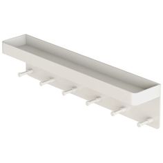 a white wall mounted shelf with four hooks