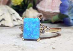 Don't miss this opportunity to own this beautiful gemstone ring crafted in 14k gold filled => Gemstone Type - Opal, Clear Quartz => Gemstone Cut - Cabochon, Faceted => Gemstone Size - 8*10 mm, 2 mm => Total Number of Gemstones - 7 => Metal Type - 14k Gold Filled (Tarnish Resistant And Nickel Free) - also available in 925 sterling silver * Please contact me for pricing on a sizes larger than 11 * ~ Feel free to ask me about custom made designs. ❏ Replacements and custom orders : ✪ Rectangular Rings With Accent Stones For Anniversary, Fine Jewelry Rectangular Rings With Accent Stones, Rectangular Promise Ring With Accent Stones, Rectangular Gemstone Promise Ring, Gia Certified Rectangular Diamond Ring, Rectangular Rings With Gemstone Accents, Fine Jewelry, Rectangular Rings With Gemstone Accents In Fine Jewelry Style, Fine Jewelry Rectangular Ring With Gemstone Accents, Fine Jewelry Rectangular Birthstone Rings