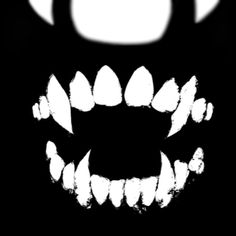 a black and white photo with teeth on the bottom half of it, in front of a dark background