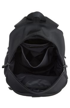 the inside of a black backpack with zippers and straps on it's sides