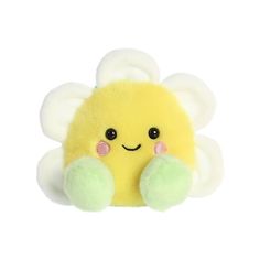 a small yellow stuffed animal with white wings and pink cheeks on it's face