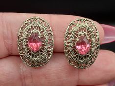 Antique 1930s Czech Glass Pink Sparkle Earrings Clip Silvertone  Length 2.2cm  Very good condition To note - please look at all photographs carefully as they form part of the description. I do my best to describe things as accurately as possible. I do combine postage. Packaging - I will sometimes use recycled packaging - your item will come in a box and will be also wrapped carefully in the box. I aim to post within 3 working days of payment.  My items are all vintage and will have some wear unl Vintage Oval Earrings Hallmarked, Vintage Oval Hallmarked Earrings, Vintage Oval Pierced Earrings, Vintage Round Screw Back Earrings, Antique Clip-on Earrings For Anniversary, Vintage Oval Jewelry With Screw Back, Antique Round Earrings With Screw Back, Vintage Round Earrings With Screw Back, Vintage Formal Earrings