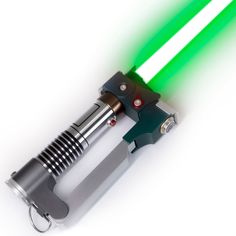 a green light saber is being used as a flashlight