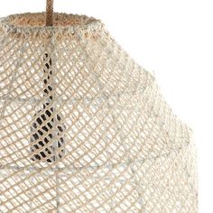 a light that is made out of rope and has a brown cord hanging from it