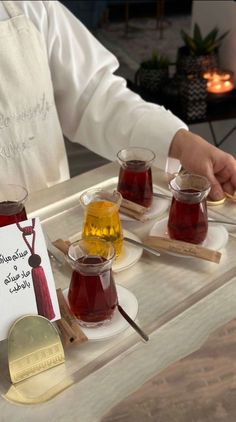 a tray with some teas on top of it