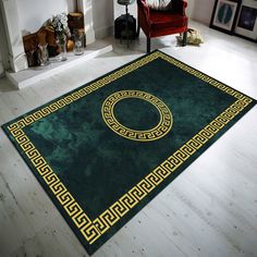 a green rug with gold greek border on the floor in a living room next to a red chair