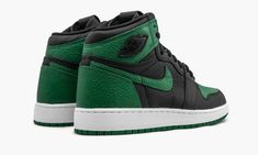 The Air Jordan 1 GS “Pine Green” is the youth sizing of the green-based colorway of Michael Jordan’s first signature shoe.  Released in February 2020, the “Pine Green” AKA "Green Tow" Jordan 1 follows the color blocking of the iconic “Bred Toe” design, only substituting in a decidedly Boston Celtics inspired color palette.  Buttery black leather overlays are contrasted by the aforementioned perforated green leather toe while a green Swoosh and black Wings logo on the collar provide additional de Jordan 1 Green, Air Jordan Sneakers, Wings Logo, Black Wings, Pine Green, Air Jordan 1 High, Kids Jordans, Jordan 1 High, Boston Celtics