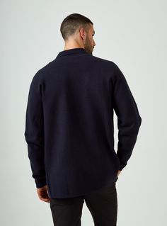 This cozy, chunky knit sweater will take your outfit to the next level. Model is 6'1" and wears a size medium. Care & Composition Delicate cool wash Do not tumble dry, dry flat Iron on low Do not dry clean 77% Cotton | 15% Acrylic | 8% Polyester Navy Long Sleeve Wool Polo Sweater, Navy Wool Long Sleeve Polo Sweater, Navy Polo Sweater For Winter Workwear, Navy Long Sleeve Sweater For Work, Blue Merino Wool Long Sleeve Cardigan, Textured Knit Long Sleeve Outerwear With Relaxed Fit, Navy Wool Winter Tops, Casual Blue Merino Wool Polo Sweater, Cozy Navy Sweater For Winter