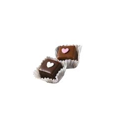 two pieces of chocolate with hearts on them