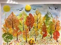 an art project with watercolors and acrylic paint on paper, depicting trees in the fall