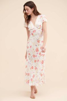 Rent Evie Floral Maxi Dress from Nuuly. Pick 6 items for $98/month. Free shipping + returns. Feminine Silk Maxi Dress For Garden Party, Spring V-neck Silk Dress With Bias Cut, Spring Dresses With Short Sleeves And Bias Cut, Spring Dresses With Bias Cut And Short Sleeves, Spring Short Sleeve Bias Cut Dresses, Spring Bias Cut Dresses With Short Sleeves, Feminine Silk Maxi Dress For Brunch, Feminine Silk Midi Dress For Garden Party, Spring Feminine Bias Cut Dress