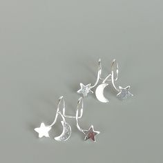 Sterling silver ear cuff and wrap earring.Comes with a crescent moon and stars. This listing is for ONE PAIR Size: 15 x 19 mm Stars: 5x 5mm Crescent moon: 6 x 5mm Weight: 0.90gm These earrings are made of real 925 hypoallergenic sterling silver. All my pieces are sent in a gift box. I can include a personal message from you if needed You are welcome to contact me at... bhavnakwintra1956@gmail.com For more beautiful pieces from my shop, please browse 👇 TOE RINGS: https://www.etsy.com/your/shops/ Celestial Silver Cartilage Earrings, Silver Star-shaped Ear Cuff As Gift, Silver Star Shaped Ear Cuff As Gift, Silver Star Shaped Ear Cuff Gift, Silver Star-shaped Ear Cuff For Gift, Silver Celestial Cartilage Earrings Nickel Free, Silver Celestial Cartilage Earrings Nickel-free, Celestial Silver Nickel-free Cartilage Earrings, Silver Strand