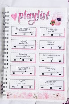 a planner with pink flowers and words on it that says playlist from dress up