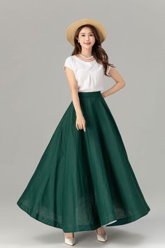 Get ready to elevate your summer style with our stunning emerald green flowy maxi linen skirt! This versatile piece is a must-have for any occasion, whether it's a day out with friends or a laid-back evening look. Stay effortlessly cool and chic in this breezy skirt that exudes a touch of elegance. 🍀 

SKU 4929 

#SummerFashion #LinenSkirt #Fashionista #GreenSwing #SummerStyle #Xiaolizi Simple Long Skirt, How To Style Green Skirt, Green Wide Leg Lined Maxi Skirt, Emerald Green Clothes, Elegant Green Wide Leg Maxi Skirt, Green Full Maxi Skirt With Lining, Green Full Maxi Skirt With Pockets, Green Linen Maxi Skirt For Summer, Green Flowy Flared Maxi Skirt