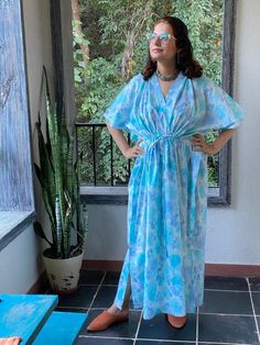 I made this caftan dress from a beautiful ombre watercolor pattern and is available in many colors. I used the softest mulmul cotton fabric to make this. It is extremely soft and it gets softer with every wash.It is so free flowing, that it will make you feel as if you aren't wearing anything at all ;)The beauty of the Kaftans is they will fit everyone so no need to worry about the size et all. All my Kaftans have deep necks(11-12 inches) so will fit all head sizes.However, the length of my kaft Beach Dresses With Relaxed Fit And Kimono Sleeves, Relaxed Fit Dresses With Kimono Sleeves For Beach, Blue Flowy Maxi Dress For Loungewear, Blue Relaxed Fit Maxi Dress For Beach, Blue Relaxed Fit Kaftan For Beachwear, Blue Relaxed Fit Beachwear Kaftan, Blue Maxi Kaftan For Loungewear, Blue Maxi-length Kaftan For Loungewear, Blue Kimono Sleeve Lounge Dress