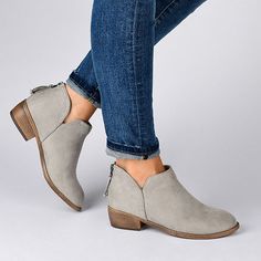 Show off versatile style with the side-split buckle booties by Journee Collection. These ankle booties have soft faux suede uppers that rise to the ankles and highlight a side-split detail and back zippers with tassel accents.Closure Type: ZipperShaft Circumference: 11 1/2 InchesBoot Shaft Height: 3 1/2 InchesShoe Heel Height: 1 1/2 InchesUpper/Outer Base Material: 100% PolyuretheneShoe Lining Material: FabricSole Material Content: 100% PolyurethaneToe Type: Closed Toe, Round ToeHeel Style: Stac Buckle Booties, Suede Block Heels, Round Toe Heels, Journee Collection, Shoes Booties, Side Split, Designer Heels, Black Booties, Versatile Style