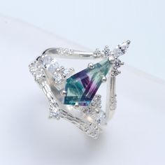 "Multi Fluorite Vintage Ring, Natural Gemstone Ring, 925 Sterling Silver Jewelry for Women, Cubic Zirconia Ring, Crown Designer Ring, 3 Gm. Ring Details:- Material   -   925 Sterling Silver Stone Name -   Rainbow Fluorite Shape  --- Kite Stone Size   -  13X6 mm Ring Weight -  3 gm. Quantity-         1 PC \"Payment\" We Accept Payment Only Through PayPal  \"Shipping Handling Time: We Take no handling time, We ship to Worldwide, Please make sure your shipping address is correct. Shipping Services: The shipping company takes business to deliver the product 7-13 days for International Shipping. The Item will be shipped in safe and beautiful packing. Business day does not include Sundays. \"Return-Policy\" Merchandise must be returned within a maximum of 30 days on receipt. Merchandise must be Fluorite Engagement Ring, Gemstone Crown, Ethereal Romantic, Fluorite Jewelry, Crown Engagement Ring, Fluorite Ring, Green Gemstone Ring, Rutilated Quartz Ring, Princess Ring