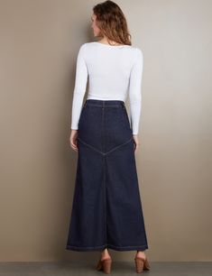 Details of old, made new. Beautiful waist/button detail, with pieced Premium denim construction, the Pieced Denim Maxi Skirt from Wash Lab is a must-own classic. The cover model is 5'9" wearing a size 26 Fabric: 95% Cotton 4% Polyester 1% Spandex Length: 39.25" from waist Fitted Recycled Denim Skirt With Pockets, Casual Fitted Denim Skirt In Recycled Material, Casual Fitted Denim Skirt In Recycled Denim, Fitted Casual Denim Skirt From Recycled Material, Casual Fitted Recycled Denim Skirt, Fitted Medium Wash Recycled Denim Skirt, Dark Wash Denim Skirt With Pockets From Recycled Material, Dark Wash Recycled Denim Skirt With Pockets, Dark Wash Denim Skirt With Pockets In Recycled Denim