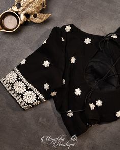 "❤️❤️Jet Black Gorgette Chikankari ❤️❤️ An Imperial Black Pure Georgette saree, with hand-embroidered with snow-white chikankari flowers and borders.  Together with a similarly embroidered black blouse, half sleeves, rounded neck, cutback with tassels for fastening. *Fall, Pico & Tassels : Done *Condition : New Saree With Stitched Blouse *Ready to Wear *Dry Clean Only Blouse:  Pattern blouse with front buttons. Padded. Size 38\" expandable up to 42/44 or can be downsized too. Weight : Approximat Pure Georgette Sarees, New Saree, Black Pure, Pattern Blouse, Georgette Saree, Georgette Sarees, Blouse Pattern, Blouse Patterns, Jet Black