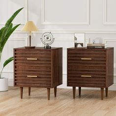 two wooden nightstands sitting next to each other on top of a hard wood floor