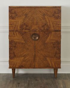 an old wooden cabinet with two doors