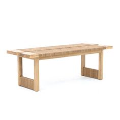 a wooden bench sitting on top of a white floor