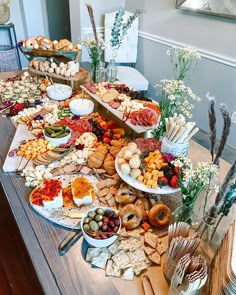 a table filled with lots of different types of food