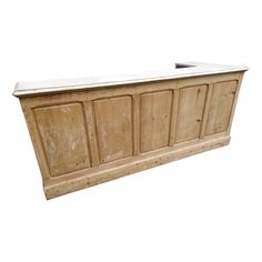 an old wooden cabinet with white marble top and drawers on one side, isolated against a white background