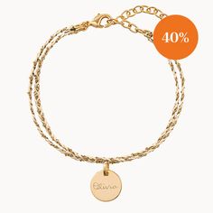 Available in a range of striking colours, our beautifully handwoven Personalized Braided Chain Bracelet is the perfect mix of sentiment and style, hand-engraved with your own special words.Available in 18K Champagne Gold PlatedAdjustable chain from 5.5 to 7Charm: 10mm diameter, 0.5mm thicknessSecure clasp fasteningCharm can't be removed from this chainHand-engraved in our Paris workshopSent with love in a complimentary gift boxAny slight variations in lettering depth, spacing and alignment from the examples shown are part of the aesthetic and originality of the piece. Engraved Braided Bracelets As Gift, Engraved Round Braided Bracelets As Gift, Engraved Braided Bracelet As Gift, Engraved Braided Bracelet Gift, Adjustable Yellow Gold Name Bracelet, Adjustable Engraved Chain Bracelet For Gifts, Adjustable Engraved Chain Bracelet For Personalized Gift, Engraved Adjustable Chain Bracelet For Personalized Gift, Adjustable Yellow Gold Braided Bracelet With Jubilee Detail