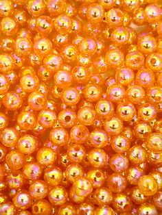 ♥ Unleash your creativity with our Vibrant Orange Bubble Beads, specially designed for crafting stunning bracelets and captivating Halloween jewelry. These beads exude a lively and energetic charm, reminiscent of a harvest moon on a crisp autumn night. Craft one-of-a-kind bracelets that evoke the spirit of Halloween with these eye-catching beads. The translucent orange hue lends an enchanting glow to your creations, making them perfect for themed jewelry or adding a pop of color to any accessory. ♥ Made from acrylic. ♥ Dimensions: 6mm or 8mm ♥ Picture shows 6mm size Orange Polished Beads Bracelet, Orange Faceted Beaded Bracelets, Orange Faceted Round Beaded Bracelets, Orange Beaded Bracelets With 8mm Round Beads, Orange Spacer Beads For Gifts, Orange Spacer Beads, Orange Round Spacer Beads, Orange Spacer Beads For Jewelry Making, Orange Round Beads Party Bracelets