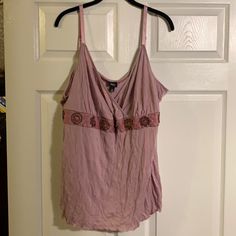 I Cut The Tags Off & Hung It In The Closet. Now It Doesn’t Fit. Never Worn. Really Pretty Mauve Color With An Embellished Band In Front. Adjustable Straps. Perfect For Layering Or By Itself In A Warmer Setting. Embellished Camisole Tank Top For Summer, Casual Embellished Tank Top, Slavic Outfit, Embellished Camisole Tank Top, Coquette Camisole With Contrast Lace, Feminine Purple Camisole Top, Pink Lace Trim Camisole Top, Pink Fitted Vintage Camisole, Embellished V-neck Tank Top For Summer