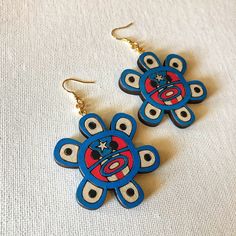 Hand painted PR flag on Taino Sol with gold jump rings & fishhooks.  - Taino Sol 2 inches - 3mm jump rings  - gold fishhooks  - hand painted PR Flag Pr Flag, Print On Paper Bags, Classy Earrings, Puerto Rico Flag, Cool Piercings, Beaded Earrings Patterns, Shop Jewelry, Earring Patterns, Red Bead