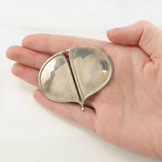 More Unique Sterling Silver Brooches: https://www.etsy.com/shop/Vintage925Chi?section_id=15203699 Beautiful Modernist Silver Brooch Circa 1980 This brooch is 2 3/8" inches long It is 1 3/4" inches wide The brooch weighs 14 Grams Stone or design featured on this brooch is Abstract   The color of the stone or design is  Markings, if any are: MPI, 23 , (Tested & Guaranteed to be Sterling Silver) Condition of this brooch is Great, heavy patina Stock# B1902Dor NOTE: Variations in color in the picture Mid-century Silver Brooches For Collectors, Mid-century Silver Brooch For Collectors, Sterling Silver Brooch, Silver Brooch, Coco Chanel, Chicago Il, Sterling Silber, Beautiful Things, Brooch Pin