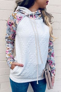 I'm in LOVE with this quilted sweatshirt!  The quilted pattern is pretty and soft, the arms are a light weight stretchy fabric with a really pretty pink, peach, grey and olive print, zipper detail on the shoulder, rope draw strings, with a generous neck and the hood is doubled layered it's so cool!  This sweatshirt is stretchy and meant to be true to size fitted, however you can always size up for a more relaxed fit.     grey hair model 5'7" 38D 175lbs wearing the XL. which is my normal sweatshi Quilted Hoodie, Double Hoodie, Sweatshirt Makeover, Matching Sweats, Quilted Sweatshirt, Winter Must Haves, Floral Sleeve, Knit Hoodie, Printed Sleeves