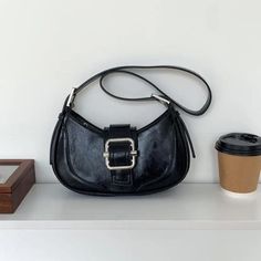 Introducing the Crescent Baguette Bag - a classic vegan leather bag with a timeless aesthetic featuring a magnetic buckle clasp, zip closure, and adjustable strap. It's the perfect accessory for any outfit - day or night! (And no, it's not actually made from bread.) 🥖✨ Dimensions: 26X14X7 CM Jeweled Bag, Timeless Aesthetic, Vegan Leather Bag, Baguette Bag, Crescent, Vegan Leather, Leather Bag, Adjustable Straps, Buckle