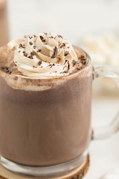 there is a hot chocolate drink with whipped cream on top